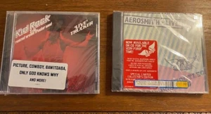 Lot of two SEALED CD's AEROSMITH- "LIVE BOOTLEG" & KID ROCK- "LIVE TRUCKER" - Picture 1 of 2