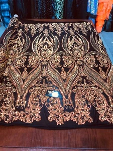ORANGE IRIDESCENT BIG DAMASK SEQUINS DESIGN ON A BLACK 4 WAY STRETCH MESH YARD. - Picture 1 of 8