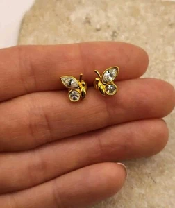 Pendientes perforados vintage de diamantes de imitación mariposa tono dorado de Avon - Imagen 1 de 9