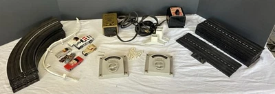 Vintage Lot 1960’s Aurora Model Motoring 5 Cars, Tracks 2 Transformers & Extras - Image 1 of 4