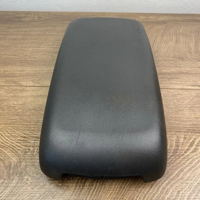 Saturn Aura 2007-2009 consola central tapa reposabrazos almacenamiento tapa de vinilo negro solamente Foto 1 de 4