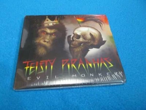 Feisty Piranhas Evil Monkey CD posthume Veröffentlichung für Peter Alex Lust III Neu - Bild 1 von 1