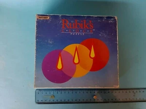 RUBIK'S CLOCK PUZZLE 1988 MATCHBOX ROMPICAPO  NUOVO VINTAGE  - Foto 1 di 6