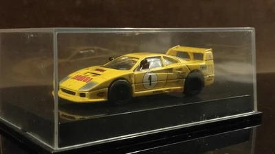 Ferrari F40 Racing Car n.1 LM Gialla con Vetrinetta Hot Wheels 1:43 Diecast - Immagine 1 di 2