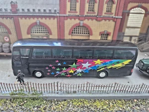 Rietze H0 Bus Kässbohrer-Setra S 315 HDH mehrfarbig mit Sternen in OVP/2509 - Bild 1 von 9