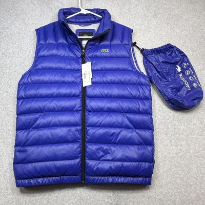Chaleco acolchado Lacoste para hombre medio azul relleno repelente al agua empaquetable BH2864 Foto 1 de 4