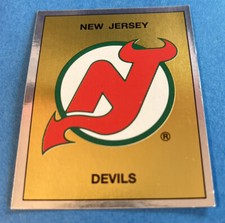 1988 - 89 Panini Stickers #265 New Jersey Devils Foil Team Logo NHL