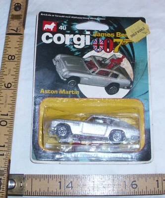 ERTL JAMES BOND 007 ASTON MARTIN SPY CAR NEW ON CARD - Image 1 of 2