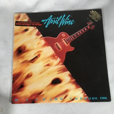April Wine Walking Through Fire Vinyl Record LP Capitol Records ST-12433 1985 - Image 1 of 4