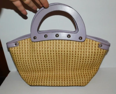 NEAT PREOWNED MAXX NEW YORK RETRO STYLE WEAVE PURSE WITH FLORAL FABRIC INSIDE - Image 1 of 4