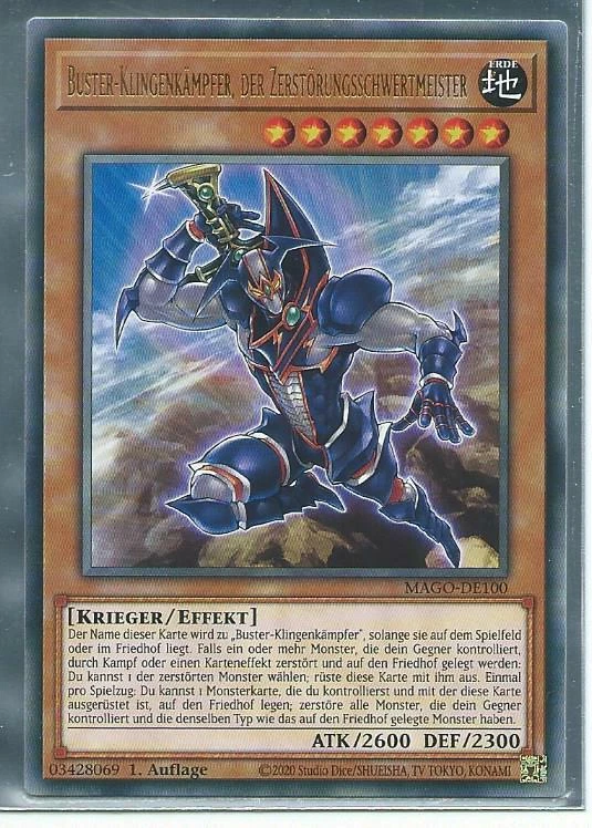 YU GI OH BUSTER KLINGENKÄMPFER DER ZERSTÖRUNGSSCHWE MAGO-DE100 GOLD LETTER RARE  - Bild 1 von 1