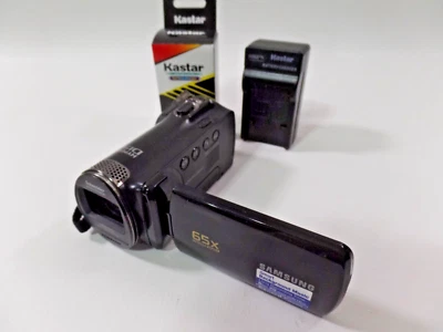 Videocámara digital SAMSUNG HYPER DIS SMX-F50BN/XAA con cargador Foto 1 de 4