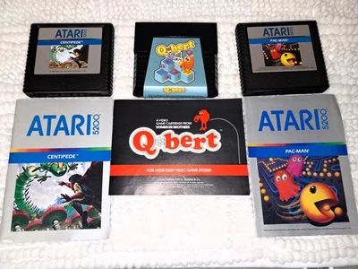 3 pcs Atari 5200 Pac-Man, Q*bert, Centipede cartridges and manuals set lot - Image 1 of 4