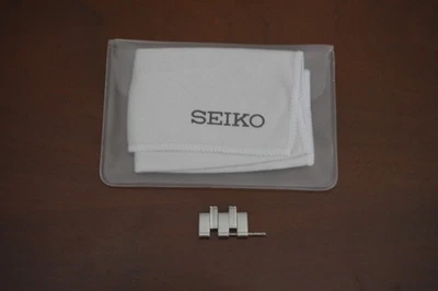 Seiko Watch Bracelet 20mm.sizing link with pin +cleaning cloth for the crystal - Image 1 of 3