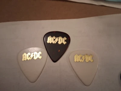 Lote de 3 púas de guitarra AC/DC raras Angus, Malcolm, Cliff Foto 1 de 4