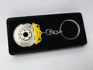 PORSCHE BRAKE CALIBER KEYCHAIN YELLOW NEW IN BOX VERY COOL! - Picture 1 of 3