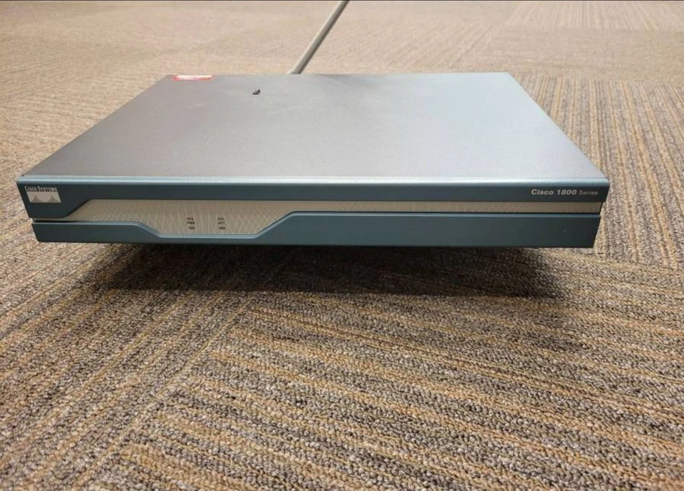 Router de red cableado integrado Cisco serie 1800 1841 (V04) ¡con flash de 64 MB! Foto 1 de 1