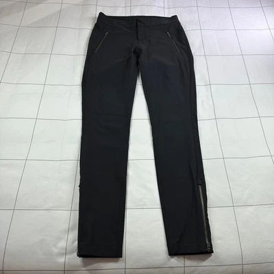 Pantalones ajustados Athleta negros Wander Stash para mujer 2 bolsillos con cremallera informales versátiles Foto 1 de 4