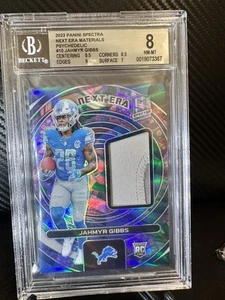 2023 Panini Spectra Jahmyr Gibbs Next Era Material Psychedelic /5 RC Lions BGS - Bild 1 von 6