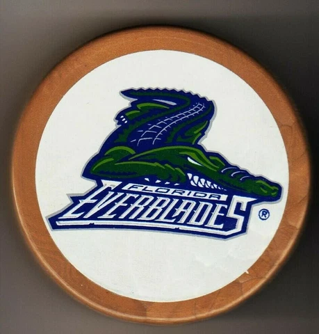 Florida Everblades ECHL 2001 Gold USA Hockey Puck Baby Happy New Year Gator Toga Cover