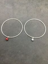 Silver Bracelets With Red And Silver Jingle Bell.
