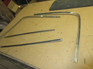  1963 OLDSMOBILE STARFIRE REAR GLASS  TRIM MOLDING PARTS LOT - Picture 1 of 6