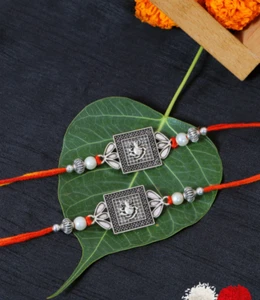 Ganesha Oxidised Silver Rakhi 2 Pcs for Brother - Picture 1 of 5