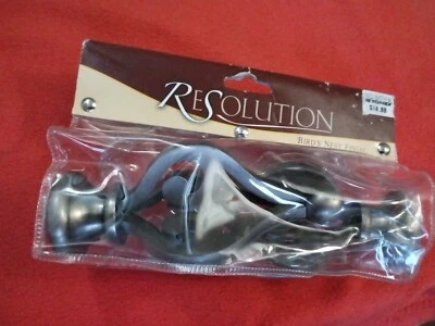 Remate de barra de cortina de nido de aves Resolution Foto 1 de 4