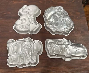 WILTON Cake Pans Big Bird GI Joe Disney Pixar Lightning McQueen Lote de 4 - Imagen 1 de 12