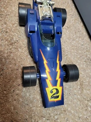 JOHNNY LIGHTNING - ESTUCHE DE TRANSPORTE VINTAGE DE COCHE DE CARRERAS AL UNS INDY - MUY BONITO Foto 1 de 4