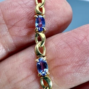 14k Yellow Gold tennis Bracelet 5x3mm 13 natural Tanzanites 5.8 gm 7.5in. - Picture 1 of 8