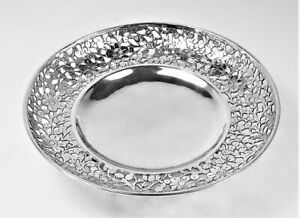 Bowl sterling silver pierced/engraved flowers and leaves, three ball feet
