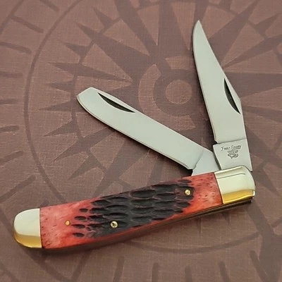 Frost Cutlery Knife Made in Japan Mini Trapper Reddish Jigged Bone Handles - Image 1 of 4
