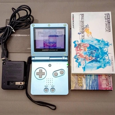 Nintendo Game Boy Advance SP Console Pearl Blue & Final Fantasy Tactics etc - Image 1 of 4