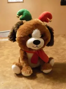Cucciolo di cane animato natalizio canta Babbo Natale sta arrivando in città - Foto 1 di 5