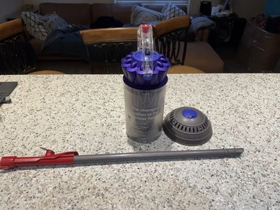 Cubo ciclónico púrpura Dyson 41 piezas aspiradora bola con prefiltro, varita, media rueda Foto 1 de 4