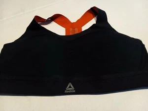 Reggiseno sportivo Reebok senza ferretto taglia small nero e arancione. Nuovo senza etichette. - Foto 1 di 7