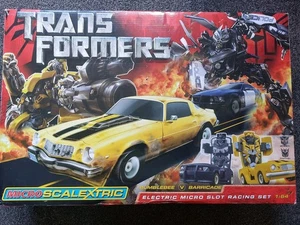 Scalextric Micro slot racing Transformers Set 1:64 BUMBLEBEE v BARRICADE - Picture 1 of 4