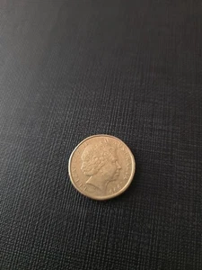 1999 $1 DOLLAR COIN INTERNATIONAL YEAR OF OLDER PERSONS - CIRCULATED AUSTRALIAN - Picture 1 of 2