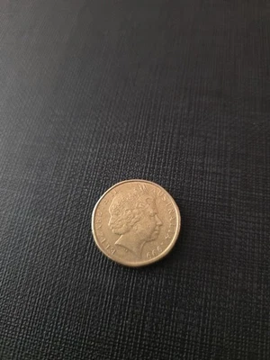 1999 $1 DOLLAR COIN INTERNATIONAL YEAR OF OLDER PERSONS - CIRCULATED AUSTRALIAN - Image 1 of 2