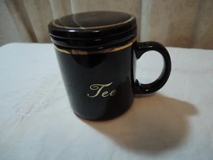 Tasse Teebecher Teetasse mit Deckel und Siebeinsatz, Keramik Goldrand schwarz - Bild 1 von 4