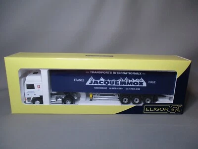 DV11111 CAMION ELIGOR 1/43 VOLVO F12 GLOBETROTTER TAUTLINER  JACQUEMMOZ 115491 - Photo 1/4