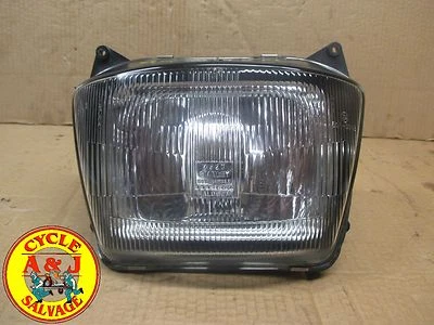 Faro Kawasaki ZX-600C, ZX-750F, 1 lengüeta rota Foto 1 de 4