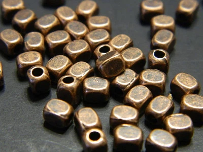 Cuentas espaciadoras de aleación de metal cuboide rectangulares de cobre pequeñas de 4,5 mm - estilo tibetano Foto 1 de 4