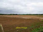 Photo 6x4 Arable field with Didlington Nursery in distance  c2019