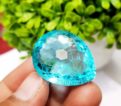 73 Ct Blue Topaz Pear Football Carving Cut Glass Filled Loose Gemstone - Image 1 of 4