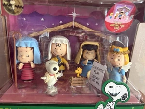 Juego de mini figuras de juego de belén de Navidad Peanuts con escenario de juego desplegable - Imagen 1 de 6