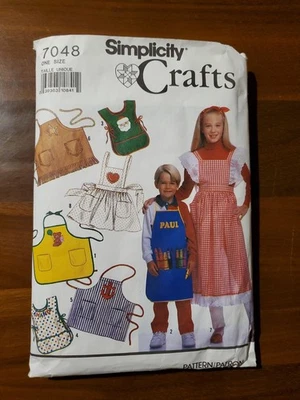 Simplicity 7048 Child's Aprons w/ Pockets One Size Sewing Pattern - Image 1 of 2