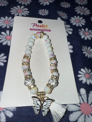 Pulsera expandible de cristal blanco y dorado Foto 1 de 4