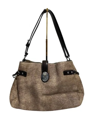 Bolso de hombro Tumi marrón para mujer Foto 1 de 4